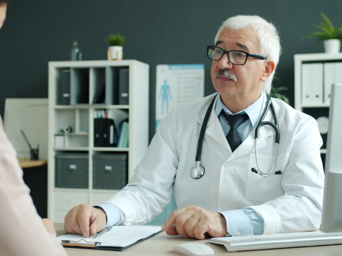 A Shrivix healthcare partner consulting with a patient